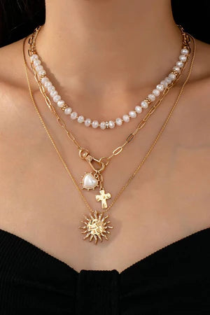 RADIANT FAITH LAYERED CHARM NECKLACE