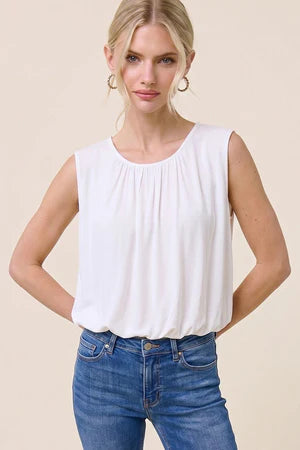 THE IVORY PLEAT TOP